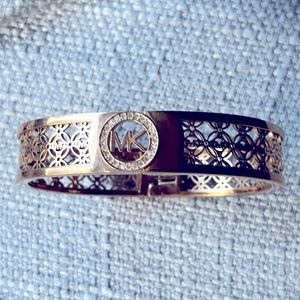 MK rose gold bangale.